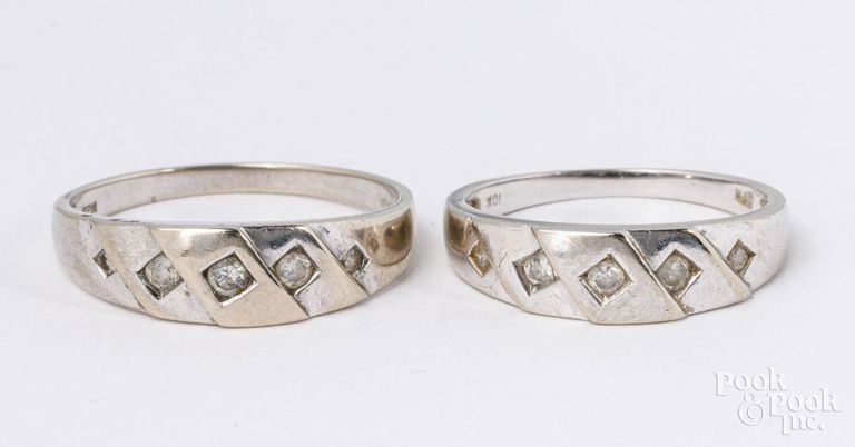 Two matching 10k white gold diamond wedding rings
