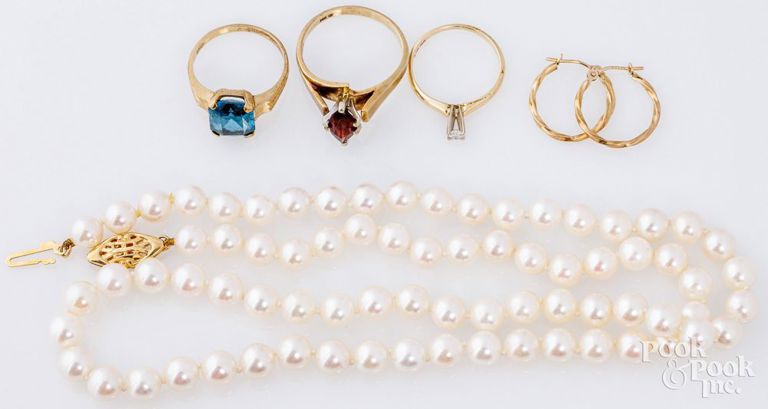 Three rings, pair of earrings and necklace