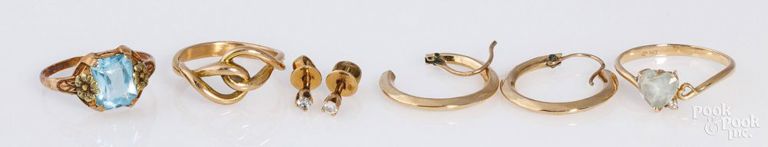 Three gold rins, gold earrings and gold-plated earrings