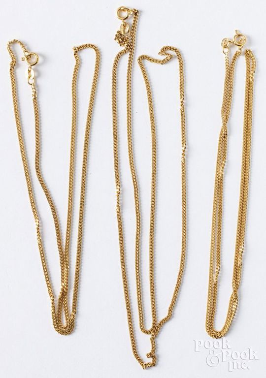 Three 14k yellow gold chain necklaces