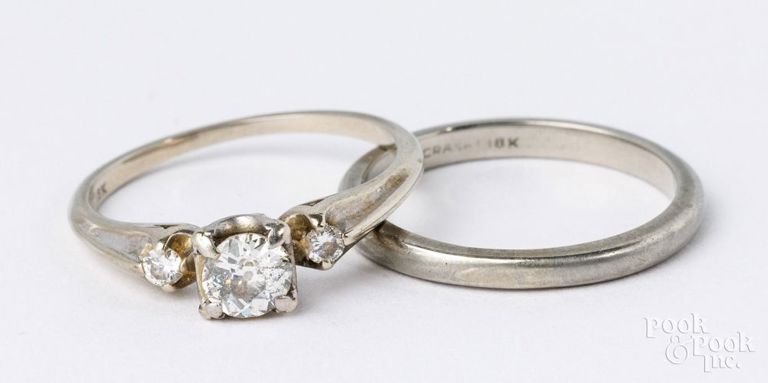 18k white gold diamond engagement ring and 18k white gold wedding band