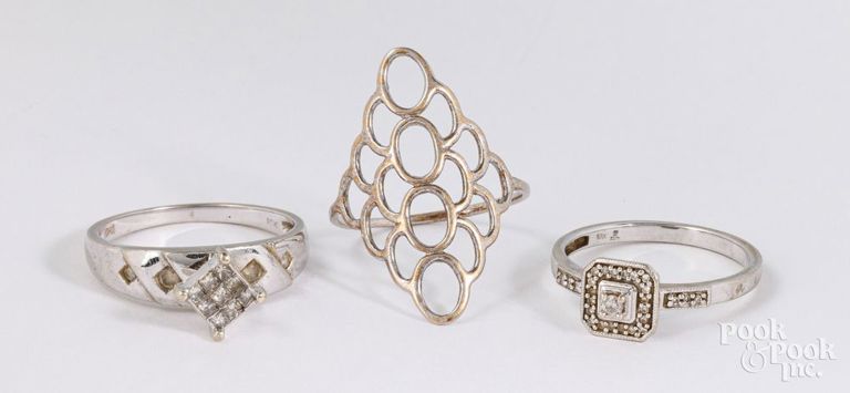 Three 10k white gold rings