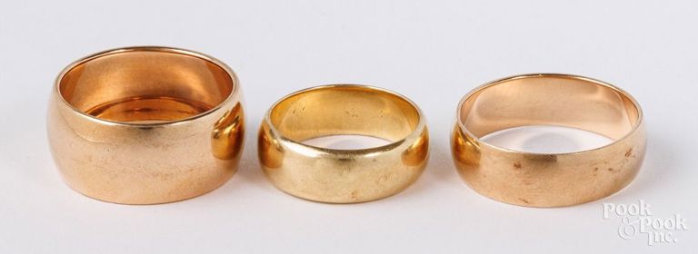 18k yellow gold ring and two 14k rose gold rings