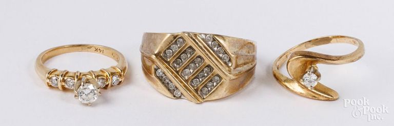 Three yellow gold diamond rings