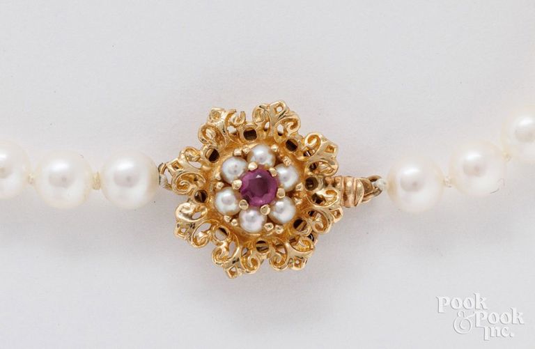 Cultured pearl necklace with 14k yellow gold ruby clasp