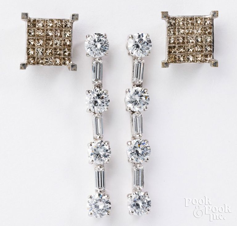 10k white gold diamond earrings and 14k white gold cubic zirconia earrings