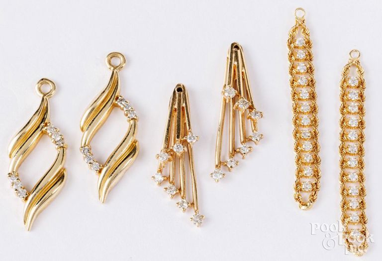 Three pairs of 14k yellow gold diamond earrings