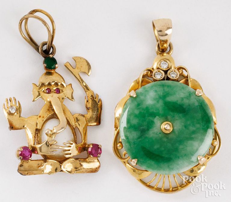Two yellow gold gemstones pendants