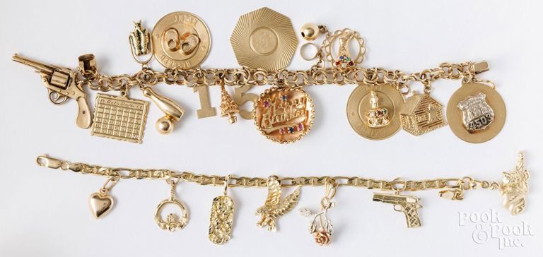 Two 14k yellow gold charm bracelets