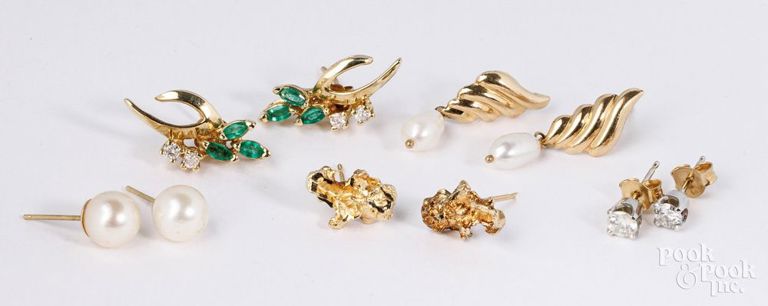 Five pairs of 14k gold earrings
