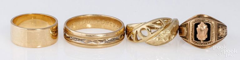 Three 14k yellow gold rings and 10k gold ring