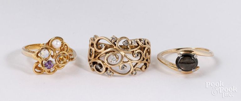 Three 14k yellow gold rings