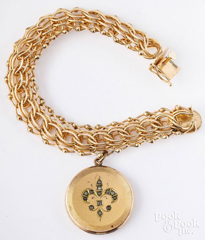 14k yellow gold bracelet with gold-plated charm