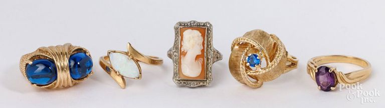 Five 14k yellow gold rings