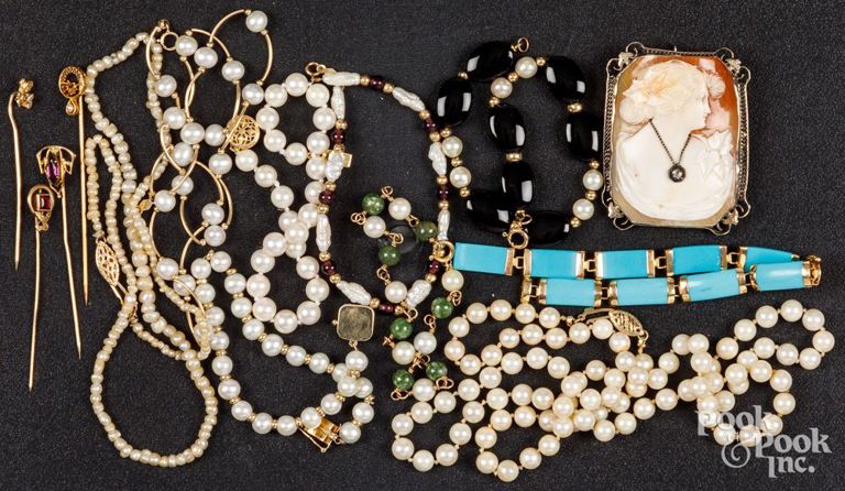 14k and 10k gold jewelry with gemstones