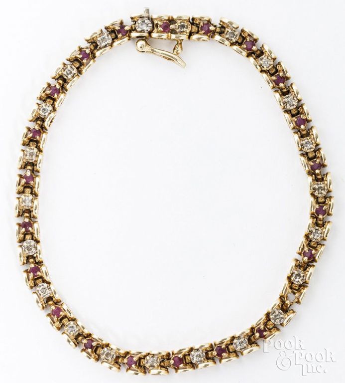 14k yellow gold diamond and ruby tennis bracelet