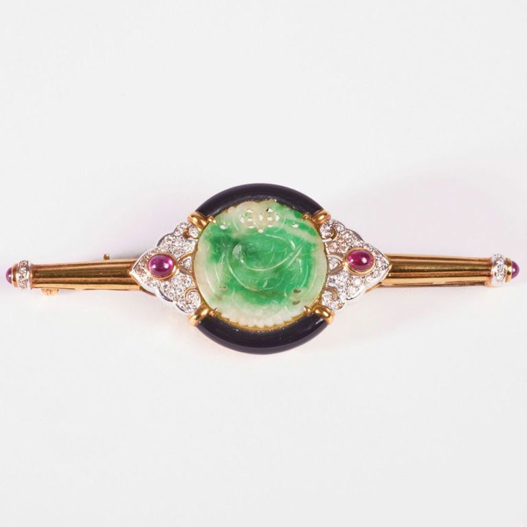 18k gold Art Deco jade, onyx, diamond, and ruby brooch