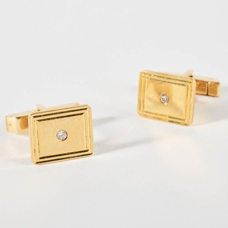 Tiffany & Co. pair of 14k gold and diamond cufflinks