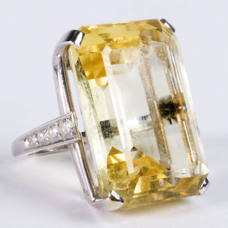 Yellow sapphire and diamond ring