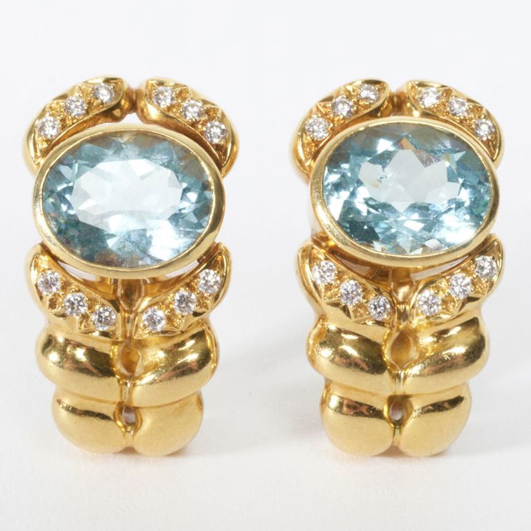 18k gold blue topaz and diamond earclips