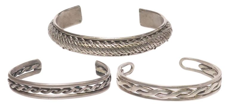 Artisan hand-made sterling and silver cuff bracelets