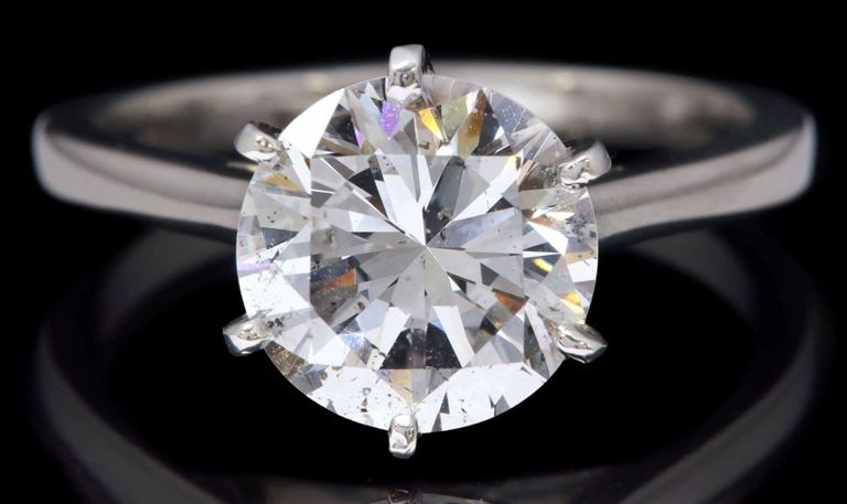 Platinum diamond solitaire engagement ring