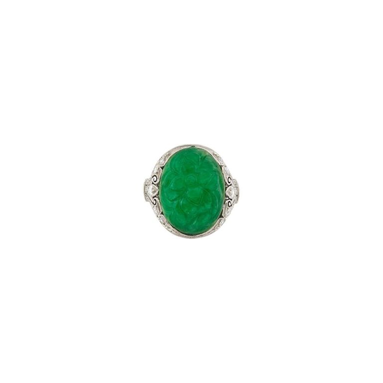 Platinum carved jade and diamond ring