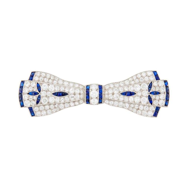 Platinum diamond and sapphire bow brooch