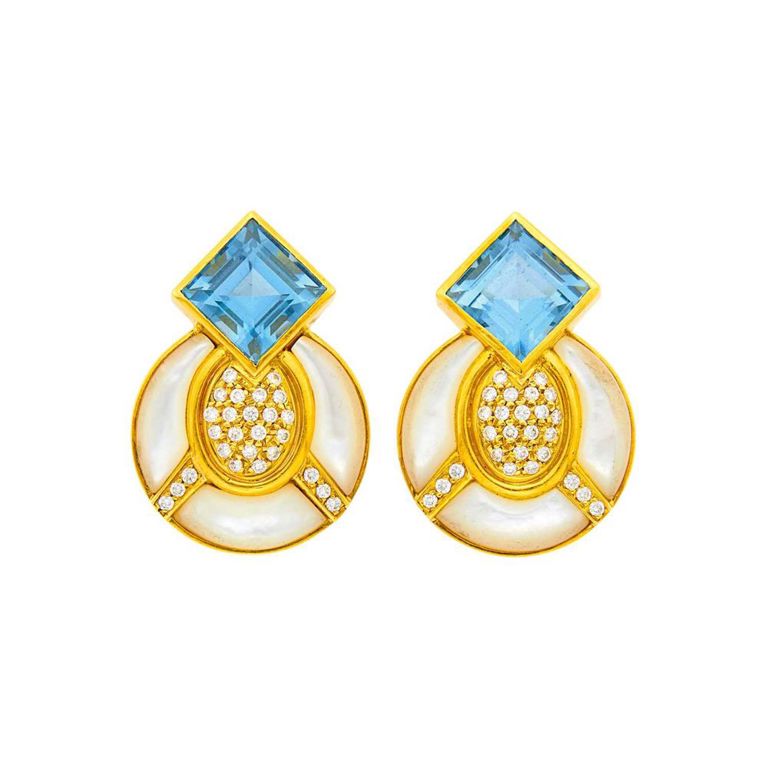 18k gold blue topaz and mother of pearl earrings