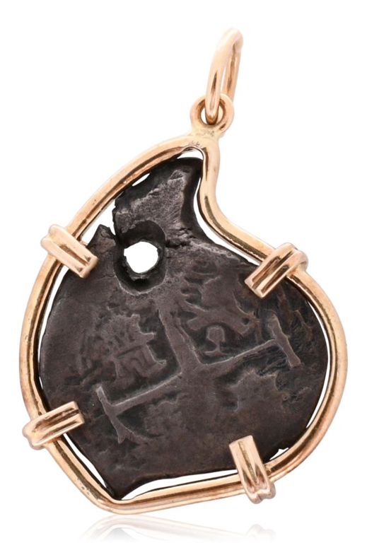Spanish cob coin mounted on a yellow gold pendant