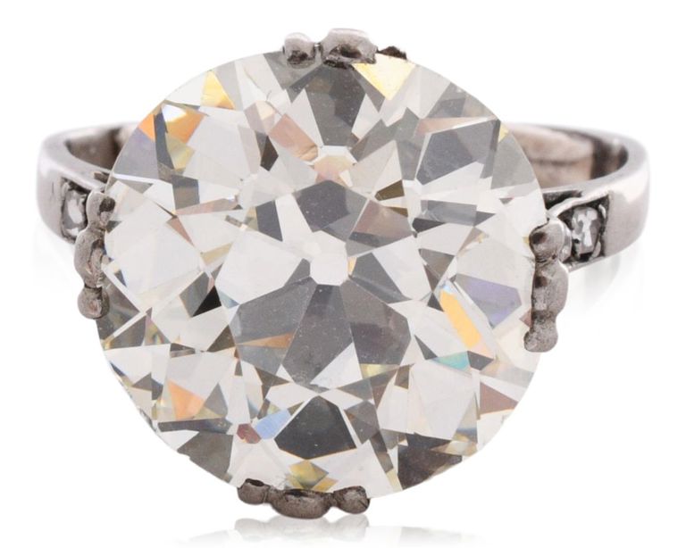 Antique diamond solitaire ring