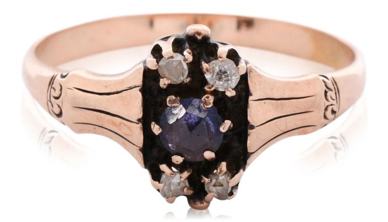 Low karat gold sapphire and diamond ring