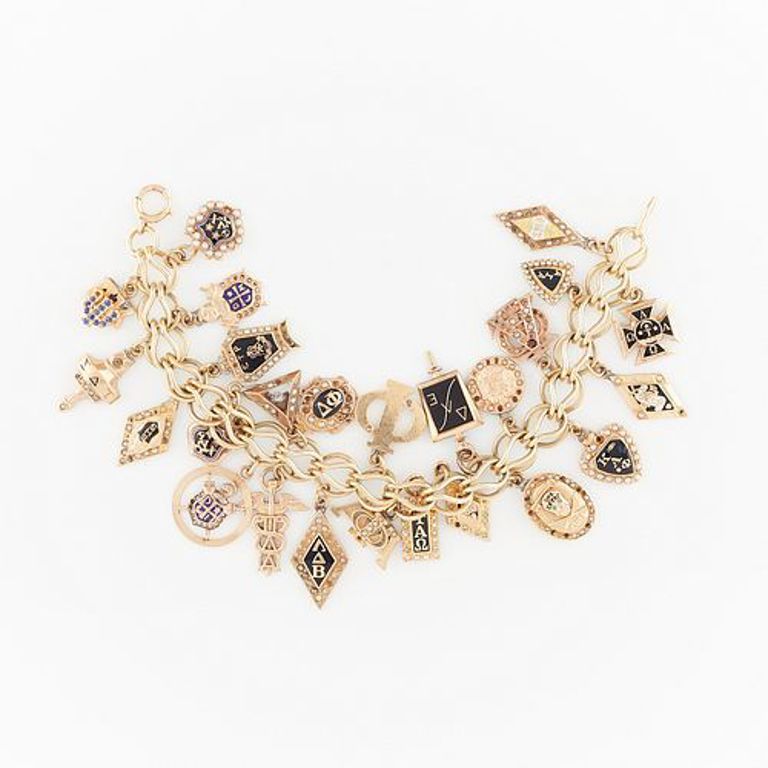 14k gold charm bracelet with 10k and gold-filled charms