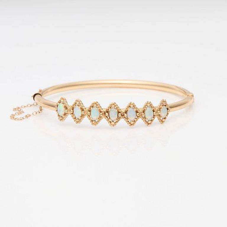 14k yellow gold hinged opal bracelet