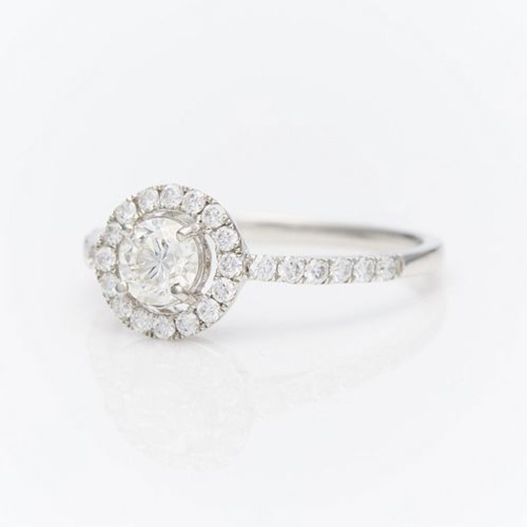 Platinum diamond ring with floating halo