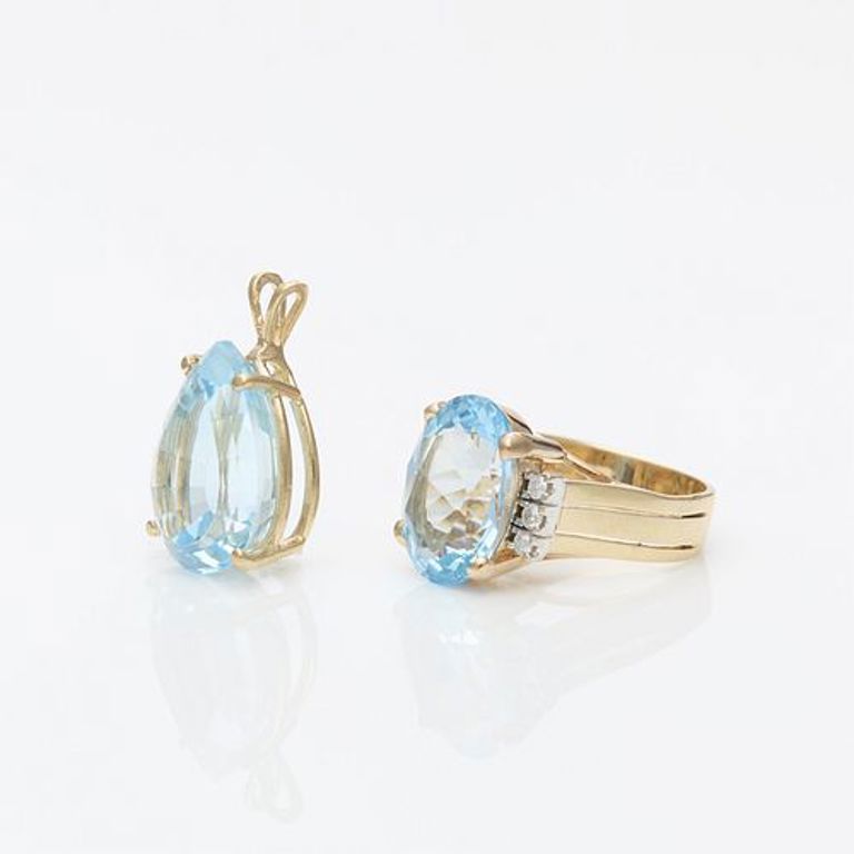 Group of 14k yellow gold and blue topaz jewelry