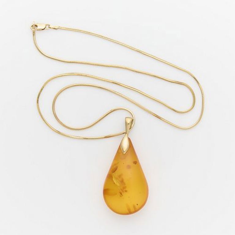 Large amber drop pendant on 14k gold chain