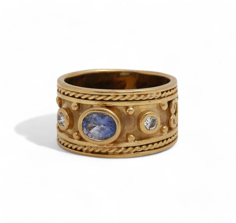 Sapphire, diamond and 18k gold band