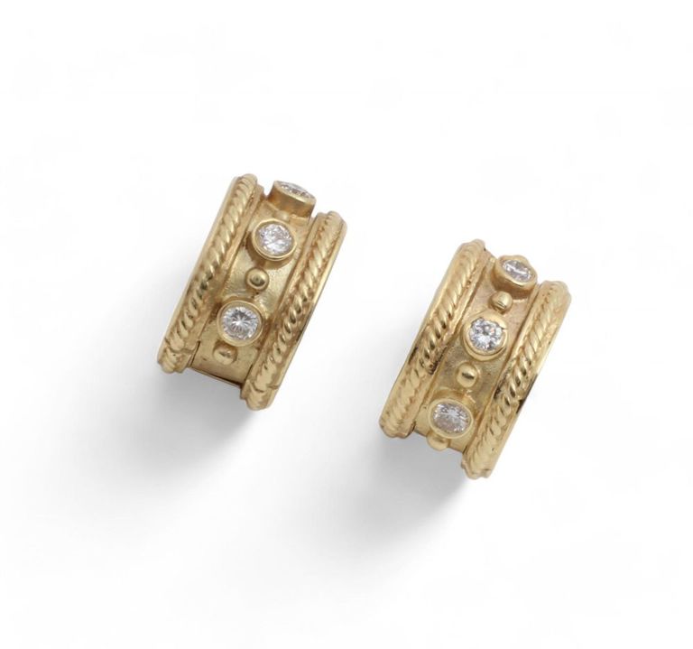 A pair of diamond and 14K gold hoop earrings