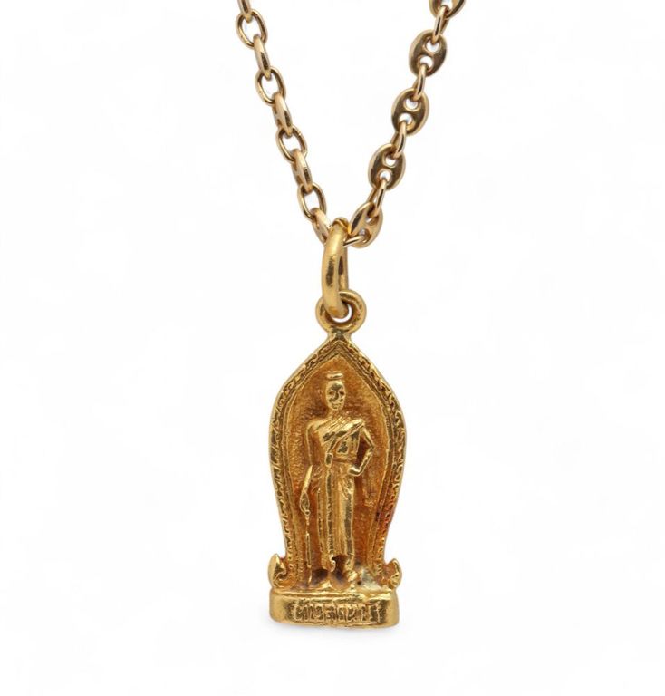 High karat gold figural pendant with 14k chain