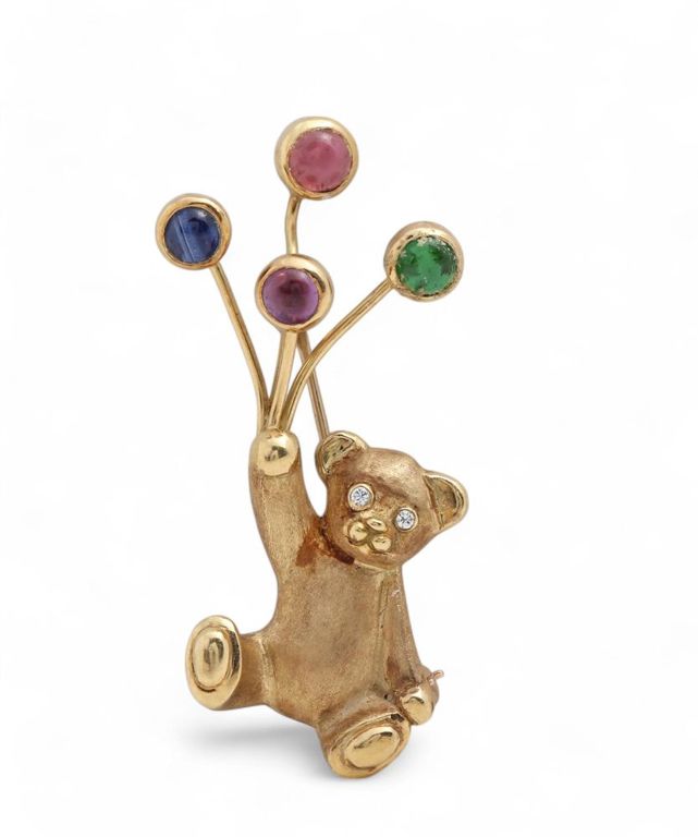 18k gold gemstone brooch
