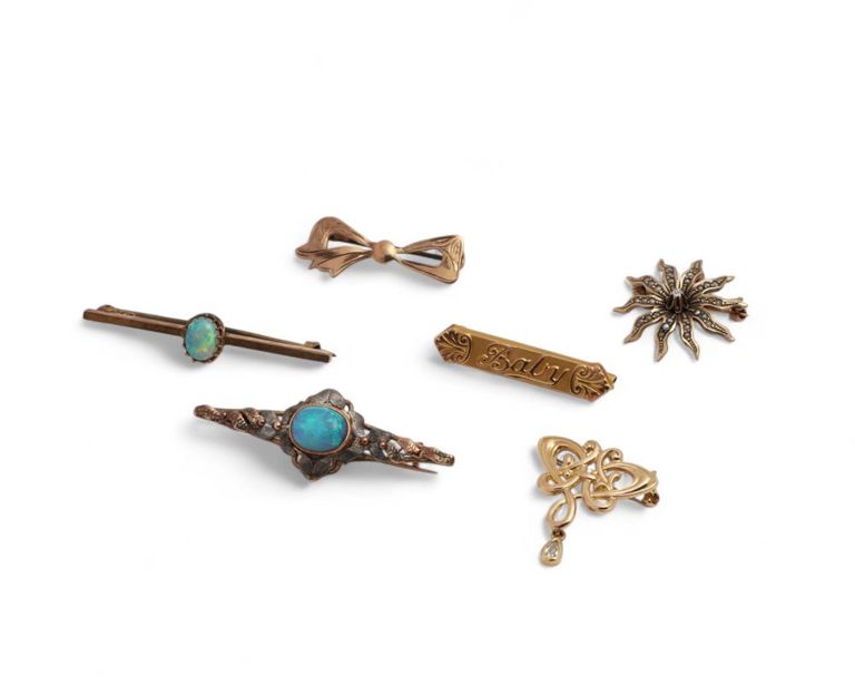 Collection of opal, diamond, seed pearl and gold brooches