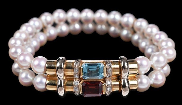 Yellow gold two strand pearl bracelet