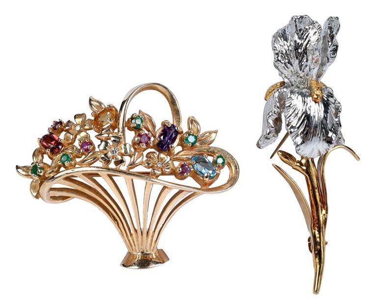 Gold floral brooches with gemstones