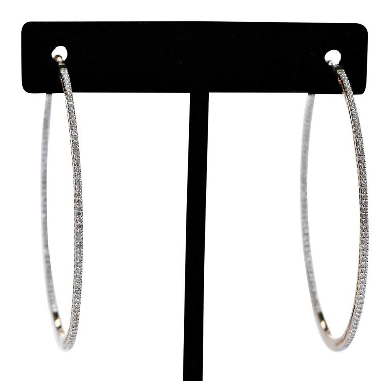 Yellow gold huggie diamond earrings