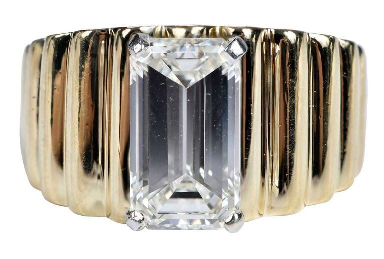 18k yellow gold solitaire emerald cut diamond ring