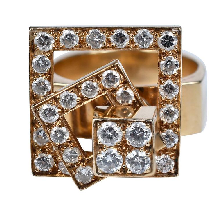 Yellow gold spinner diamond ring