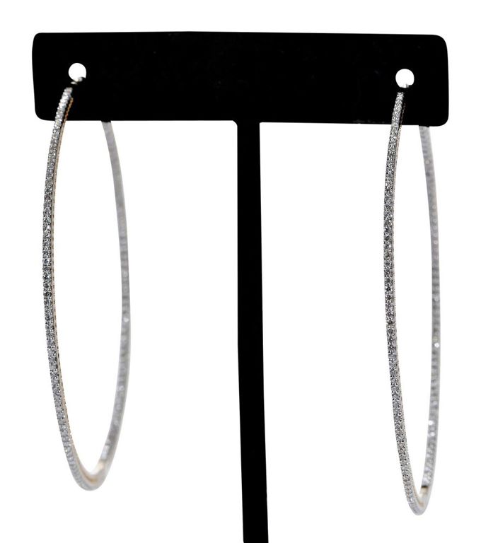 Yellow gold huggie diamond earrings