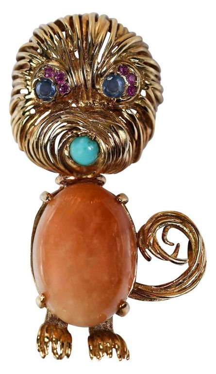 Yellow gold gemstone brooch