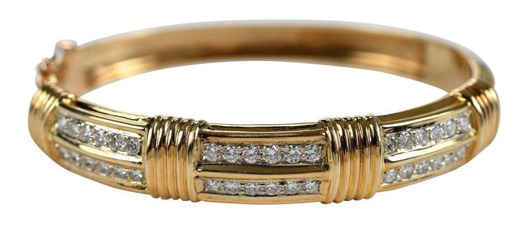Yellow gold hinged diamond bracelet